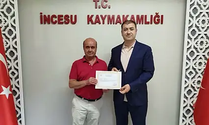 Kayseri'de emekliye ayrılan MEM şefine kaymakamdan başarı belgesi