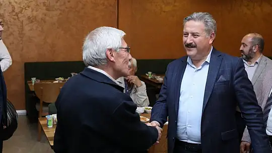 Palancıoğlu, emekli personel ve ailesi ile bir araya geldi