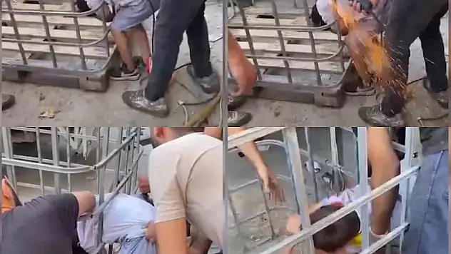 Adana'da demir parmaklıklara sıkışan çocuk kurtarıldı!