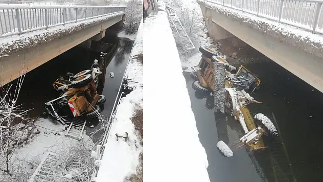 Kayseri'de kar küreme çalışması yapan iş makinesi su kanalına düştü!