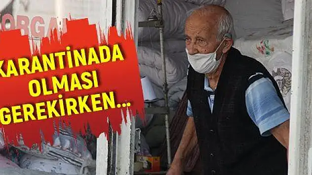 Karantinada olması gereken yaşlı adam dükkanında yorgan dikerken yakalandı