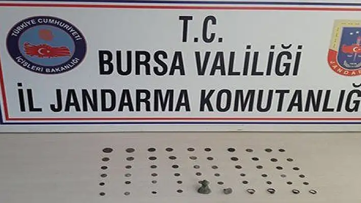 Kayseri'de izinsiz kazıdan çıkardığı tarihi eserleri Bursa'ya getirirken yakalandı 