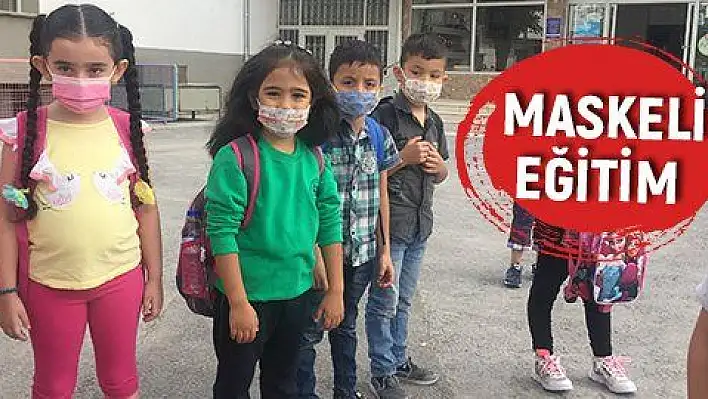 Minikler yüz yüze eğitime maskeleri ile geldi