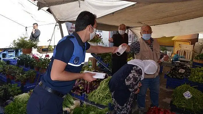 Bünyan'da maske dağıtıldı, işletmeler denetlendi 