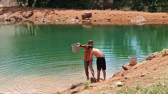 Develi'de şifalı gölet ziyaretçi akınına uğruyor